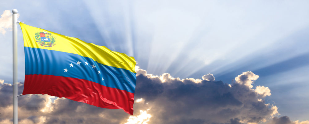 Venezuela waving flag on blue sky. 3d illustration